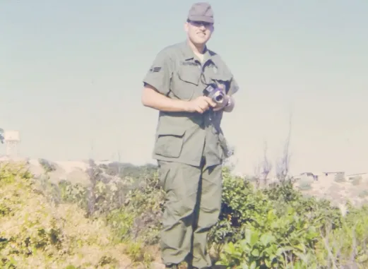 old photo of Neil in the Air Force